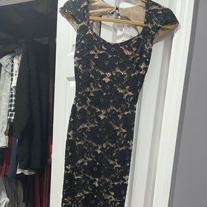 Lace black and nude dress